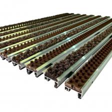 Грязезащитная придверная решетка Эксперт ворс-щетка, служит для удаления грязи и влаги с обуви людей. Применяется для установки в тамбуре или вестибюле зданий. Состоит из ворсовых вставок и щёток на алюминиевых профилях, которые стянуты тросом из нержавеющей стали в группу, образующую единую систему грязезащитной решётки. Решётка работоспособна с температурой от +5 до +55 градусов Цельсия. При минусовой температуре влажный ворс замерзает и утрачивает свои чистящие свойства. Решетку можно укладывать как на гладкий пол, так и в специальный приямок. Снизу решетки есть специальные резиновые ножки, они защищают напольное покрытие от повреждений и снижают уровень шума при эксплуатации решетки. Преимущества: Эффективная очистка обуви. Высокая прочность. Длительный период эксплуатации. Простота установки. Грязезащитная придверная решетка Эксперт ворс-щетка, служит для удаления грязи и влаги с обуви людей. Применяется для установки в тамбуре или вестибюле зданий. Состоит из ворсовых вставок и щёток на алюминиевых профилях, которые стянуты тросом из нержавеющей стали в группу, образующую единую систему грязезащитной решётки. Решётка работоспособна с температурой от +5 до +55 градусов Цельсия. При минусовой температуре влажный ворс замерзает и утрачивает свои чистящие свойства. Решетку можно укладывать как на гладкий пол, так и в специальный приямок. Снизу решетки есть специальные резиновые ножки, они защищают напольное покрытие от повреждений и снижают уровень шума при эксплуатации решетки. Преимущества: Эффективная очистка обуви. Высокая прочность. Длительный период эксплуатации. Простота установки.