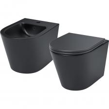 Комплект подвесной керамики Calipso в трендовом матовом черном цвете: унитаз и биде универсального дизайна подойдет к современному и классическому интерьеру. Позволит оформить ванную в едином стиле с комфортом и элегантностью. Удобное продуманное решение и выгодная покупка. Безободковая конструкция чаши унитаза и сиденье с микролифтом делают его максимально гигиеничным и удобным. Черное сиденье из матового дюропласта внешне напоминает керамику, устойчиво к царапинам, его легче поддерживать в чистоте. На время уборки сиденье легко снимается с чаши и без труда устанавливается обратно. Подходит к любой инсталляционной системе, оптимальный выбор – IDDIS® (NEO0000I32, PRO0000i32). Биде за счет компактных размеров, плотного прилегания к стене и скрытых креплений подойдет даже для небольшого санузла. С горизонтальным выпуском в стену. Имеет специальную полость, которая служит встроенным сливом-переливом на случай переполнения чаши. Диаметр слива 4,5 см. Донный клапан приобретается отдельно; можно подобрать подходящий из ассортимента IDDIS®. За счет минимального водопоглощения санитарная керамика IDDIS® не впитывает грязь и запахи. Комплект подвесной керамики Calipso в трендовом матовом черном цвете: унитаз и биде универсального дизайна подойдет к современному и классическому интерьеру. Позволит оформить ванную в едином стиле с комфортом и элегантностью. Удобное продуманное решение и выгодная покупка. Безободковая конструкция чаши унитаза и сиденье с микролифтом делают его максимально гигиеничным и удобным. Черное сиденье из матового дюропласта внешне напоминает керамику, устойчиво к царапинам, его легче поддерживать в чистоте. На время уборки сиденье легко снимается с чаши и без труда устанавливается обратно. Подходит к любой инсталляционной системе, оптимальный выбор – IDDIS® (NEO0000I32, PRO0000i32). Биде за счет компактных размеров, плотного прилегания к стене и скрытых креплений подойдет даже для небольшого санузла. С горизонтальным выпуском в стену. Имеет специальную полость, которая служит встроенным сливом-переливом на случай переполнения чаши. Диаметр слива 4,5 см. Донный клапан приобретается отдельно; можно подобрать подходящий из ассортимента IDDIS®. За счет минимального водопоглощения санитарная керамика IDDIS® не впитывает грязь и запахи.