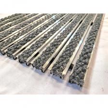 Грязезащитная придверная решетка ООО ПК ЦентрВход Эксперт ворс, размером 1200x600 мм служит для удаления грязи и влаги с обуви людей. Применяется для установки в тамбуре или вестибюле зданий. Состоит из ворсовых вставок на алюминиевых профилях, которые стянуты тросом из нержавеющей стали в группу, образующую единую систему грязезащитной решетки. Решетка работоспособна с температурой от +5 до +55 градусов Цельсия. При минусовой температуре влажный ворс замерзает и утрачивает свои чистящие свойства. Решетку можно укладывать как на гладкий пол, так и в специальный приямок. Грязезащитная придверная решетка ООО ПК ЦентрВход Эксперт ворс, размером 1200x600 мм служит для удаления грязи и влаги с обуви людей. Применяется для установки в тамбуре или вестибюле зданий. Состоит из ворсовых вставок на алюминиевых профилях, которые стянуты тросом из нержавеющей стали в группу, образующую единую систему грязезащитной решетки. Решетка работоспособна с температурой от +5 до +55 градусов Цельсия. При минусовой температуре влажный ворс замерзает и утрачивает свои чистящие свойства. Решетку можно укладывать как на гладкий пол, так и в специальный приямок.