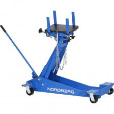 NORDBERG N32210— профессиональный подкатной трансмиссионный домкрат, предназначенный для работы с агрегатами трансмиссии в автосервисах, мастерских и ремонтных зонах.ФУНКЦИОНАЛПредназначено для подъёма, удержания и точного позиционирования коробок передач и других агрегатов трансмиссионной группы массой до 2 тонн при монтаже и демонтаже.ПРЕИМУЩЕСТВАГрузоподъёмность до 2 т — подходит для работы даже с крупными узлами трансмиссии грузовых автомобилей;Регулируемая рабочая высота от 200 до 925 мм позволяет удобно и точно подстроить позицию агрегата;Вес домкрата — 145 кг, что обеспечивает устойчивость и безопасную работу с тяжёлыми агрегатами;Широкая платформа и усиленная конструкция рамы гарантируют надёжную работу даже при высоких нагрузках.УДОБСТВО ИСПОЛЬЗОВАНИЯПростая подготовка: прокачка системы занимает не более 1 минуты, оборудование готово к работе сразу после сборки;Точная настройка: наличие винтов регулировки и подвижных пластин облегчает точное позиционирование агрегатов;Плавный гидроподъём: рукоятка управления обеспечивает точное и безопасное поднятие/опускание агрегата;Мобильность: 4 прочных колеса обеспечивают лёгкое перемещение даже при полной нагрузке.Регулируемое седло: продольного и поперечного наклона, а также точной фиксации агрегатов с помощью цепей;Габариты: 1110x640x255 мм обеспечивают удобное хранение и маневренность на ограниченных пространствах. NORDBERG N32210— профессиональный подкатной трансмиссионный домкрат, предназначенный для работы с агрегатами трансмиссии в автосервисах, мастерских и ремонтных зонах.ФУНКЦИОНАЛПредназначено для подъёма, удержания и точного позиционирования коробок передач и других агрегатов трансмиссионной группы массой до 2 тонн при монтаже и демонтаже.ПРЕИМУЩЕСТВАГрузоподъёмность до 2 т — подходит для работы даже с крупными узлами трансмиссии грузовых автомобилей;Регулируемая рабочая высота от 200 до 925 мм позволяет удобно и точно подстроить позицию агрегата;Вес домкрата — 145 кг, что обеспечивает устойчивость и безопасную работу с тяжёлыми агрегатами;Широкая платформа и усиленная конструкция рамы гарантируют надёжную работу даже при высоких нагрузках.УДОБСТВО ИСПОЛЬЗОВАНИЯПростая подготовка: прокачка системы занимает не более 1 минуты, оборудование готово к работе сразу после сборки;Точная настройка: наличие винтов регулировки и подвижных пластин облегчает точное позиционирование агрегатов;Плавный гидроподъём: рукоятка управления обеспечивает точное и безопасное поднятие/опускание агрегата;Мобильность: 4 прочных колеса обеспечивают лёгкое перемещение даже при полной нагрузке.Регулируемое седло: продольного и поперечного наклона, а также точной фиксации агрегатов с помощью цепей;Габариты: 1110x640x255 мм обеспечивают удобное хранение и маневренность на ограниченных пространствах.