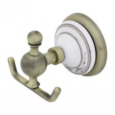 Manzzaro Genova — двухрожковый крючок для ванной комнаты, выполненный из металла с бронзовым влагостойким покрытием и керамической вставки. Такой крючок подойдёт для: полотенец любых размеров: для рук, лица или тела халатов, другой домашней одежды систем хранения: корзины для белья, навесного органайзера с карманами или полками Бронзовое покрытие и круглая керамическая розетка с растительным узором дополнят интерьеры в стиле классики, прованса, модерна и других. Manzzaro Genova — двухрожковый крючок для ванной комнаты, выполненный из металла с бронзовым влагостойким покрытием и керамической вставки. Такой крючок подойдёт для: полотенец любых размеров: для рук, лица или тела халатов, другой домашней одежды систем хранения: корзины для белья, навесного органайзера с карманами или полками Бронзовое покрытие и круглая керамическая розетка с растительным узором дополнят интерьеры в стиле классики, прованса, модерна и других.