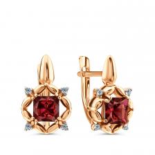 Золотые серьги с гранатом и фианитами Золотые серьги с гранатом и фианитами