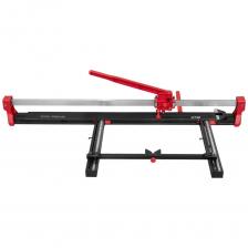 Плиткорез DLT Optima MAX – это надежный плиткорез способный резать и ломать керамогранит толщиной до 16мм. Данная модель обладает характеристиками, которыми обладают профессиональные плиткорезы: мощная литая стальная монорельса, каретка на подшипниках, усиленная стальная станина, лазерный указатель линии реза, «П-образная» боковая линейка-упор, мощная ручка разлома и т. д. Данная модель — это отличное сочетание цены и качества. Плиткорез DLT Optima MAX предназначен для точной прямой и диагональной резки любого типа керамической плитки, в том числе и крупноформатного керамогранита толщиной до 16мм. DLT Optima MAX очень мощный, он развивает разделяющее усилие до 800кг, вследствие чего плиткорез позволяет разрезать наиболее трудные для резки материалы, с приложением минимального усилия и обеспечивая высокую точность. Направляющая монорельса цельнометаллическая (не пустотная) изготовлена из стали и имеет сечение 20ммx40мм, что исключает её выгибания при разломе. Плиткорез имеет большой прочный рычаг, который позволяет оказывать на заготовку максимальное давление при минимальном усилии. Разлом плитки происходит очень плавно, так как конструкция включает специальные «плавающие» стопы. Устройство направляющей каретки плиткореза охватывает монорельс с четырех сторон и передвигается посредством механизма, который состоит из подшипников, что обеспечивает плавность хода. Рабочий стол изготовлен из стали, что делает станину станка очень прочной. Рабочий стол покрыт мембраной, которая создает амортизирующий эффект при разделении плитки, также это позволяет уменьшить жесткость резки, что особенно важно при работе с хрупкими материалами и керамогранитом с очень высоким внутренним напряжением (перекалённым керамогранитом). В комплект входят «П-образная» боковая отцентрованная линейка-упор, которая позволяют выставить плитку без дополнительной разметки, регулируя ровность реза. Линейка предназначена для серийной резки узких полос, а также для диагональной резки т. к. оснащена боковым упором для серийной резки и фиксации заготовок под углом 45?. Плиткорезы комплектуются роликовым резцом ?22 мм на подшипниках с внутренним диаметром 5мм (возможно устанавливать как родные резцы, так и от известных брендов, к примеру, RUBI). Угол заточки родного резца 135?, что подходит для плитки толщиной до 10мм, для более толстой плитки рекомендуется устанавливать резец с углом заточки 150?. Плиткорез DLT Optima MAX – это надежный плиткорез способный резать и ломать керамогранит толщиной до 16мм. Данная модель обладает характеристиками, которыми обладают профессиональные плиткорезы: мощная литая стальная монорельса, каретка на подшипниках, усиленная стальная станина, лазерный указатель линии реза, «П-образная» боковая линейка-упор, мощная ручка разлома и т. д. Данная модель — это отличное сочетание цены и качества. Плиткорез DLT Optima MAX предназначен для точной прямой и диагональной резки любого типа керамической плитки, в том числе и крупноформатного керамогранита толщиной до 16мм. DLT Optima MAX очень мощный, он развивает разделяющее усилие до 800кг, вследствие чего плиткорез позволяет разрезать наиболее трудные для резки материалы, с приложением минимального усилия и обеспечивая высокую точность. Направляющая монорельса цельнометаллическая (не пустотная) изготовлена из стали и имеет сечение 20ммx40мм, что исключает её выгибания при разломе. Плиткорез имеет большой прочный рычаг, который позволяет оказывать на заготовку максимальное давление при минимальном усилии. Разлом плитки происходит очень плавно, так как конструкция включает специальные «плавающие» стопы. Устройство направляющей каретки плиткореза охватывает монорельс с четырех сторон и передвигается посредством механизма, который состоит из подшипников, что обеспечивает плавность хода. Рабочий стол изготовлен из стали, что делает станину станка очень прочной. Рабочий стол покрыт мембраной, которая создает амортизирующий эффект при разделении плитки, также это позволяет уменьшить жесткость резки, что особенно важно при работе с хрупкими материалами и керамогранитом с очень высоким внутренним напряжением (перекалённым керамогранитом). В комплект входят «П-образная» боковая отцентрованная линейка-упор, которая позволяют выставить плитку без дополнительной разметки, регулируя ровность реза. Линейка предназначена для серийной резки узких полос, а также для диагональной резки т. к. оснащена боковым упором для серийной резки и фиксации заготовок под углом 45?. Плиткорезы комплектуются роликовым резцом ?22 мм на подшипниках с внутренним диаметром 5мм (возможно устанавливать как родные резцы, так и от известных брендов, к примеру, RUBI). Угол заточки родного резца 135?, что подходит для плитки толщиной до 10мм, для более толстой плитки рекомендуется устанавливать резец с углом заточки 150?.