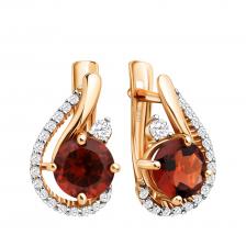 Золотые серьги с гранатом и фианитами с родированием Золотые серьги с гранатом и фианитами с родированием