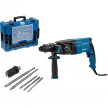 Перфоратор BULL BH 2602 Xcase (1329814) имеет мощный двигатель, который обеспечивает высокую производительность инструмента. Наличие патрона SDS-plus в перфораторе позволяет сменить оснастку легко и быстро. Перфоратор имеет 4 режима работы: сверление, сверление с ударом, долбление, а также режим поворота долота. Переключение между режимами осуществляется с помощью специального переключателя. Энергия удара (по методу расчета EPTA) - 2,8 Дж. Перфоратор оснащен функцией реверса для легкого выкручивания сверла из материала. Наличие морозоустойчивого резинового кабеля, высокотемпературная смазка редуктора. Перфоратор BULL BH 2602 Xcase (1329814) имеет мощный двигатель, который обеспечивает высокую производительность инструмента. Наличие патрона SDS-plus в перфораторе позволяет сменить оснастку легко и быстро. Перфоратор имеет 4 режима работы: сверление, сверление с ударом, долбление, а также режим поворота долота. Переключение между режимами осуществляется с помощью специального переключателя. Энергия удара (по методу расчета EPTA) - 2,8 Дж. Перфоратор оснащен функцией реверса для легкого выкручивания сверла из материала. Наличие морозоустойчивого резинового кабеля, высокотемпературная смазка редуктора.