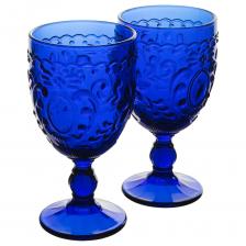 Бокалы Gipfel Ontario 51523 объемом 350 мл. В наборе 2 бокала из толстого стекла благородного синего цвета, имеющих форму бутона на изящной ножке. Рельефная поверхность с завитками в стиле барокко придаст элегантность и повседневной, и праздничной сервировке. Оригинальные бокалы по истине универсальны. В дневное время они подойдут для прохладительных напитков: лимонада, компота, свежевыжатых соков. А вечером прекрасно дополнят сервировку к романтическому ужину с красным или белым вином. Бокалы упакованы в фирменную коробку и станут прекрасным подарком. Бокалы Gipfel Ontario 51523 объемом 350 мл. В наборе 2 бокала из толстого стекла благородного синего цвета, имеющих форму бутона на изящной ножке. Рельефная поверхность с завитками в стиле барокко придаст элегантность и повседневной, и праздничной сервировке. Оригинальные бокалы по истине универсальны. В дневное время они подойдут для прохладительных напитков: лимонада, компота, свежевыжатых соков. А вечером прекрасно дополнят сервировку к романтическому ужину с красным или белым вином. Бокалы упакованы в фирменную коробку и станут прекрасным подарком.