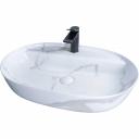 Серия Lago овальной формы — это испанское качество, соответствующее современным европейским требованиям. Раковина накладная GiD Mnc346C— стильная модель овальной формы, изготовленная из высококачественной керамики с глянцевой поверхностью в белом цвете, имитирующей натуральный камень. Она оснащена отверстием для смесителя, что делает её практичным выбором для ванных комнат в любом стиле. Раковина предназначена для установки на столешницу или мебель, обеспечивая удобство монтажа и гармоничное сочетание с интерьером. Модель отличается долговечностью, простотой ухода и элегантным дизайном, что делает её отличным решением для создания комфортного и стильного пространства.