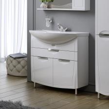 Тумба для ванной Monaco - красивый предмет гарнитура для стильной и комфортной жизни. Эргономична, функциональна, без лишних декоративных деталей, отягощающих интерьер. Отличный вариант для оформления ванной в классическом стиле. Комплектуется керамической раковиной Балтика. Корпус - ДСП, фасад - МДФ, покрытая пленкой ПВХ; Боковые стенки - глянцевая ДСП;   Выдвижной ящик на направляющих с доводчиками; Внутренние размеры ящика (ШхГхВ) 274х244х82; Внутренняя полка из ДСП за распашным фасадом;   Регулируемые ножки высотой 100 мм (спереди две ножки хром, сзади - две пластиковые); Крепеж к стене - L-образный подвес;