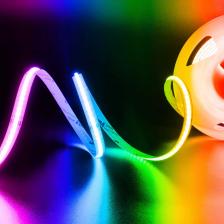 Светодиодная лента сплошная COB RGB без точек 5 мм 5м станет отличным решением для создания стильного и яркого акцента различных зон дома. Самоклеящаяся разноцветная лента 5 метров для люстры придаст уюта вашей гардеробной, спальне или детской комнате. Светодиоды лед равномерно, без мерцания осветят ваш зал, создавая яркий свет. Она гибкая и ее можно легко установить на любую стену, что позволяет создать уникальное освещение в любых помещениях. Неоновая led диодная короткая узкая лента 6 метров 24 вольт обеспечивает мягкое и равномерное свечение без заметных точек света, создавая эффект неона. Благодаря этой особенности, её можно использовать как декоративное дополнение не используя профиль, подчёркивая контуры мебели и архитектурные элементы помещения. В машине она придаст современный стиль и поможет в освещении салона. Эта светодиодная подсветка 24В 6м потолочная идеальна для ПК: она может быть установлена под шкафами, полками и столом, а также подходит для дополнительного освещения рабочей зоны компьютера. Светящаяся диммируемая цветная полоса лэд хорошо смотрится за телевизором или зеркалом, добавляя современный акцент в гостиной или ванной комнате. Светодиодная декоративная полоса работает от напряжения 24V. Контурный дизайн идеально подходит для создания цветных световых эффектов вдоль плинтусов или под натяжным или навесным потолком. Если вы хотите создать уютное пространство с приятным мягким ргб цветом, эта цветная подсветка станет лучшим выбором.