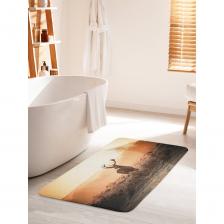 Коврик для ванной противоскользящий на пол 60х100 см станет ярким акцентом для создания домашнего уюта в интерьере вашей ванной комнаты. Большой половик для ванной, душевой и туалета выполнен из мягкого и приятного материала велсофт (100% полиэстер) с тонкой прослойкой из поролона. Велсофт- мягкий ворс, который обеспечивает комфортное прикосновение при хождении босиком. Основание изделия изготовлено из нетканого материала с антискользящим покрытием, что предотвращает его скольжение по плитке и кафелю. Края прямоугольного коврика надежно обработаны, не распушатся (не деформируются) во время эксплуатации. Быстро высыхает и не теряет своих свойств при длительном контакте с влагой. Универсальное изделие подходит для использования в бассейне, сауне, спальне в качестве прикроватного коврика и как коврик для детей. Аксессуар для ванной мгновенно впитывает влагу, быстро сохнет и не линяет. Уход: стирать при температуре 30-40 градусов, выбирая деликатный режим стирки и отжим не более 800 оборотов. НЕ ОТБЕЛИВАТЬ! Декоративная защитная подстилка с фотопринтом подходит для дома и дачи, хороший подарок маме, бабушке, папе, дедушке на День рождения, юбилей и новоселье. В комплект к коврику вы можете подобрать шторку для ванной и корзинку для белья под брендом JoyArty. Яркость рисунка может отличаться от изображения на сайте. Допустимо отклонение в размерах +- 2 см.