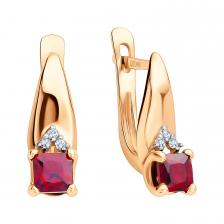 Золотые серьги с гранатом и фианитами с родированием