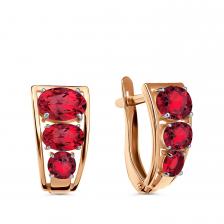 Золотые серьги с гранатом и родированием