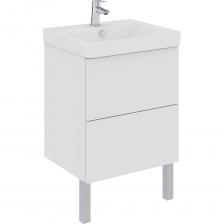 Коллекция AQUATON Юнит — настоящее воплощение минимализма и функционализма, созданные специально для тех, кто предпочитает четкую геометрию, чистый дизайн и максимальную эффективность использования пространства. Готовое решение: В комплект входят не только сама тумба, но и идеально соответствующая ей раковина Адриана 55 см, которая представлена в той же цветовой палитре. Вам больше не придется тратить время на подбор отдельных элементов. Массивные ящики: Модель снабжена двумя вместительными отделениями, позволяющими хранить большое количество предметов первой необходимости. Современные технологии: Лицевая сторона шкафчика выполнена без ручек, открывающихся простым касанием руки. Скрытые направляющие делают эксплуатацию легкой и тихой, продлевая срок службы изделия. Высокая прочность: Конструкция снабжена регулируемыми опорами и усиленным металлическим каркасом, выдерживающим нагрузку до 70 кг. Универсальность установки: Мебель доступна как в варианте с полной фиксацией на стене, так и с использованием опор, идущих в комплекте. Легкость сборки: Набор поступает покупателю в разобранном виде с понятной инструкцией по сборке и необходимым набором креплений. Детали тщательно упакованы и защищены от возможных повреждений при транспортировке. Покупая тумбу Юнит от Акутон, вы выбираете не просто красивую вещь, а целостное готовое решение, способное прослужить долго и радовать владельцев много лет подряд.