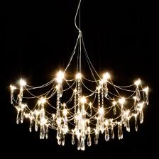 Подвесная люстра Citilux ASTER CL208020 яркий пример утончённого стиля и функциональности. Ажурный каркас собран из изящных полированных проволочных элементов. Миниатюрные светодиодные модули равномерно распределены по всему объёму люстры. Модель искусно украшена кристально прозрачными хрустальными подвесками. Люстра управляемая. С помощью радиопульта можно регулировать яркость от 10 до 100%, менять цветовую температуру от 3000К до 5500К (все оттенки тёплого, нейтрального и холодного света). Доступно включение основных режимов настенным выключателем. Мощность изделия 36Вт, световой поток 3200Лм. Люстра Ситилюкс Астер CL208020 прекрасно подойдёт для освещения гостиной, спальни, кухни и кабинета как в городской квартире, так и в загородном доме. Модель потрясающе выглядит над столом, наполняя пространство комфортным светом.