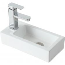 Orange B05-365RW Подвесная раковина - это элегантное и практичное решение для ванной комнаты. Она прекрасно впишется в любой интерьер благодаря своему стильному дизайну. Данная модель отличается благородным глянцевым белым цветом и четкими линиями - прямоугольная форма. Материал раковины фарфор отличается беспористой структурой, высокой прочностью и устойчивостью к различного рода загрязнениям и размножению бактерий, что позволит сохранить первоначальный вид изделия на долгие годы использования. С одним отверстием под смеситель (расположение смесителя слева), диаметр отверстия под смеситель - 35 мм, диаметр сливного отверстия - 45 мм. Модель с универсальным применением - возможен как подвесной монтаж, так и монтаж на столешницу. Смеситель и донный клапан приобретаются дополнительно.