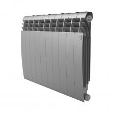 Биметаллический дизайн-радиатор для любых систем отопления с боковым подключением. Аэродинамический дизайн BILINER® позволил достичь революционной тепловой эффективности при компактных размерах. В биметаллических радиаторах Royal Thermo применяются только полностью стальные коллекторы. Это гарантирует надежную работу радиатора в системах, подверженных гидроударам и с химически агрессивными теплоносителями, в том числе антифризами. Повышенная мощность, технология POWERSHIFT® Дополнительное оребрение на вертикальном коллекторе секции увеличивает теплоотдачу радиатора на 5% - а значит, помещение нагревается быстрее. Три цвета дизайнерской палитры FUTURA AKZONOBEL (Нидерланды) Радиаторы BILINER выпускаются в трёх цветах: белый, серебристо-серый и чёрный. Можно подобраться радиатор к цветовой гамме любого интерьера. Oxsilan® 9807 – новое поколение экологически чистого покрытия без тяжелых металлов и фосфатов Oxsilan® 9807 наносится на секцию радиатора перед покраской и за счет улучшенной адгезии лакокрасочного покрытия повышает антикоррозийную стойкость и долговечность радиатора. Сверхстойкая 7-этапная NANO-покраска TECNOFIRMA® Надежная защита от подделок Изготовлено по ГОСТ России Изготовлено по ТУ- 4935-002-14713117-2014 в соответствии с ГОСТ 31311-2005.