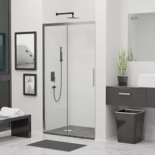 Душевая дверь RGW LE-12 – качественное и стильное дополнение любой ванной комнаты. Благодаря элегантному дизайну и прочной конструкции эта душевая дверь идеально подходит для тех, кто хочет обновить пространство своей ванной комнаты. Толщина стекла 6 мм обеспечивает прочность и долговечность, а прозрачный цвет стекла придает элегантность душевой зоне. Цвет профиля в хроме дополняет любой декор ванной комнаты, придавая ей современный и изысканный вид. Эта душевая дверь общей высотой 1950 мм обеспечивает достаточное прикрытие и конфиденциальность. Двойные регулируемые ролики делают открытие и закрытие двери плавным и легким. Конструкция раздвижной двери добавляет удобства и функциональности ежедневному приему душа. Это обеспечивает легкий доступ и экономит место в небольших ванных комнатах. Размеры с диапазоном регулировок (А): 1070-1110 мм Ширина первой створки: 500 мм Ширина второй створки: 452 мм