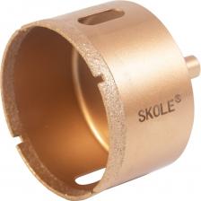 Алмазная коронка SKOLE предназначена для сверление отверстий в керамограните, керамической плитке и стекле. Не имеет центрирующего сверла. Идеально подходит для работы с шаблонами. Наилучший результат достигается при вращение 500-800 оборотов в минуту. Сверление можно проводить как с охлаждением сверла и места сверления водой, так и без охлаждения. Имеет цилиндрический трехгранный хвостовик диаметром 10мм.Не допускается использование в ударном режиме!  