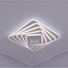 Люстра потолочная Gameto 63203-500-3D - это изысканное сочетание надежных материалов и современного дизайна. Её лаконичные линии и формы добавят утонченности и функциональности вашему дому.ХарактеристикиЦвет: белый; Площадь освещения: до 25 м?; Основание: квадратное, металл; Монтаж: к основанию люстры с помощью планки.Большой радиус освещенияМощность светодиодной люстры составляет 228 Вт и освещает площадь до 25 м?. Подходит для натяжных потолков, гипсокартонных, деревянных и бетонных.Экономия энергииПотолочная люстра светодиодная экономит энергию, так как не излучает ультрафиолет и инфракрасный свет. Она безвредна для здоровья и предотвращает выцветание материалов. Акриловые вставки прячут светодиоды, исключая ослепление и мерцание.Простота сборки и установкиПлафоны устанавливаются на основание потолочного светильника с помощью коротких втулок. Светильник светодиодный легко монтируется на потолок при помощи монтажной планки и винтов.Удалённое управлениеЛюстра потолочная светодиодная с пультом имеет 2 режима управления: пульт дистанционного управления и клавиша включения. В комплект светодиодной потолочной люстры входит пульт дистанционного управления на батарейках. Сами батарейки (тип AAA) приобретаются отдельно.