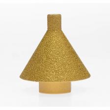 Фреза алмазная конусная 10-50 мм М14 DIDFRALM1050 для керамогранита, камня Diamond Industrial представляет собой высококачественную оснастку, предназначенную для быстрой чистовой обработки различных материалов: керамика, керамогранит, камень, мрамор, стекло, гранит. Монолитная конструкция фрезы и технология ваккумной пайки алмазов обеспечивают фрезе высокую прочность и долговечность, а также позволяют осуществлять обработку без использования дополнительного водяного охлаждения. Посадка М14 позволяет использовать фрезу на любой УШМ ("болгарке") или прямошлифовальной машине (при использовании дополнительного переходника с М14 на цилиндрический хвостовик 6 мм, приобретаемого отдельно). Специальная форма фрезы позволяет производить фрезерование с предварительным сверлением отверстия диаметром 10 мм и последующей раззенковкой. В теле сверла 10 мм находится специальный воск для дополнительного охлаждения при сверлении.