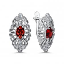 Серебряные серьги с гранатом и фианитами с родированием