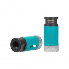 Профессиональные алмазные коронки Премиум класса, произведенные по особенной технологии вакуумно-жидкостного спекания, при котором алмазы расположены в строго распределенном порядке, за счет чего коронки позволяют производить быстрое и чистое сверление с минимальными сколами (на уровне коронок с гальваникой), с сохранением высокой скорости сверления и большого ресурса, даже без использования водяного охлаждения, которыми характеризуются коронки вакуумной пайки, это лучшее что есть на данным момент из коронок данного типа. Высота алмазной кромки: 10 мм Max глубина сверления: 35 мм Посадочное место: M14 (накручивается непосредственно на вал УШМ) Тип сверления: безударное, мокрое/сухое Оборудование для применения: болгарка, УШМ, углошлифовальная машина Применение: керамогранит, керамическая плитка, все виды натурального и искусственного камня Рабочая скорость вращения УШМ: 10000-14000 об/мин  