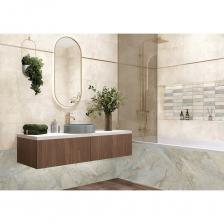 Глянцевая коллекция Arty — это сочетание текстуры разноцветного мрамора мятного оттенка и бежевого горного песчаника. Коллекция состоит из двух базовых плиток этих текстур и одного акцентного артикула, который объединяет их в прямоугольных фрагментах в виде кирпичей на рельефе. Такой набор элементов позволит создать индивидуальный дизайн, зонировать помещение и выделить функциональные зоны. Гармоничным сочетанием к этой серии станет плитка в виде деревянных плашек из коллекции Aurea. Дополняет композицию керамический бордюр 13x600 мм в платиновом цвете и матовый керамогранит в формате 600x600 мм.