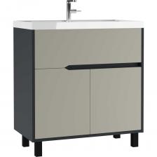 Тумба под раковину 80 Karat Серый тауп В1 Домино - идеальное решение для вашей ванной комнаты. Эта стильная и функциональная тумба под раковину сочетает в себе лаконичный дизайн и высокое качество материалов. Она прекрасно впишется в интерьер, добавляя элегантности и комфорта. Изготавливаясь с учетом современных тенденций, данная тумба станет отличным дополнением вашей мебели для ванной. Благодаря продуманному дизайну и вместительному ящику, она обеспечивает удобное хранение всего необходимого - от средств личной гигиены до полотенец. Вы забудете о беспорядке в ванной и сможете поддерживать порядок с легкостью. Тумба в ванную комнату "Classica 80" имеет прочную конструкцию, что гарантирует ее долговечность и износостойкость. Удобен также и монтаж - мы позаботились о том, чтобы процесс установки не занял много времени и усилий. К тому же, развивая идеи функциональности, мы создали тумбочку, которая подарит вам достаточно пространства для умывания и ухода за собой. Эта тумба под умывальник не только практична, но и стильна - ее внешний вид позволит вам создать гармоничное пространство, где приятно проводить время. Мебель для ванной "Classica 80" стремится стать центральной частью вашего интерьера, наполняя его теплотой и уютом. Приобретайте тумбу под раковину "Classica 80" и наслаждайтесь каждой минутой, проведенной в вашей ванной комнате. Мы гарантируем, что этот элемент мебели станет вашим верным помощником и источником вдохновения для создания уюта и стиля в вашем доме.  