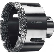 Коронка алмазная вакуумная ЗУБР Профессионал Технология ВВС (Высокотемпературное Вакуумное Спекание алмазов) позволяет работать алмазным инструментом без применения водяного охлаждения и сверлить самые твердые материалы. Предназначена для сверления отверстий в керамограните, камне, керамике, бетоне, кирпиче, ограниченно в листовом металле, дереве и комбинаций всех этих материалов. Используется на УШМ. Внимание, изображение товара может отличаться от реального! Верные параметры указаны в технических характеристиках товара.