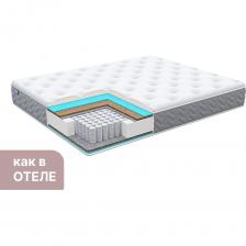 Матрас Димакс Bliss Choice + понравится тем, кто предпочитает достаточно плотные спальные места высокого комфорта. Модель обладает практичной жёсткостью – выше среднего и позволяет с удобством отдыхать с любой из спальных сторон. Первое, что привлекает внимание при взгляде на матрас – роскошный пышный чехол. Его высота впечатляет – 4 см. Такая толщина создает эффект сна на облаке. Сразу три слоя наполнителей и мягкий трикотаж формируют уникальную по комфорту и удобству спальную поверхность, которую не захочется покидать. Внутри матраса установлен независимый блок пружин. Концентрация спиралей – 256 элементов на квадратный метр позволяет добиться правильной поддержки для спины человека. Каждая пружина работает независимо и тем самым обеспечивает матрасу эффект точечной подстройки. Слоями комфорта выступают сразу два вида наполнителей – натуральный кокос и упругая пена. Оба материала обладают гипоаллергенным и экологически чистым составом. Кокос продолжает работу пружин и усиливает ортопедический эффект, а пена снижает жёсткость, передавая поверхности более выраженные адаптивные свойства. Матрас выполнен в двуцветной гамме со стильным серым бурлетом из рогожки.