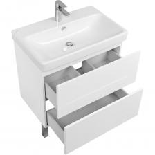 Тумба AQUATON Юнит 70 с раковиной Adriana — идеальный дуэт для идеальной ванной комнаты Совмещенная с удобной раковиной Santek Adriana, серия мебели «Юнит» представляет собой оптимальное сочетание эстетики и функциональности. Минималистичный стиль: лаконичные линии белого глянца создают атмосферу чистого и аккуратного пространства. Комплектность: в набор входит готовая к установке раковина, освобождая вас от поисков подходящей сантехники. Максимум пользы: Два больших внутренних ящика предоставляют достаточное количество места для всех нужных вещей. Современные технологии: Отсутствие наружной фурнитуры и технология открытия нажатием делают использование простым и комфортным. Универсальность: Комбинируется с различными аксессуарами и мебелью, прекрасно интегрируясь в любой интерьер. Простота сборки: Комплектуется всеми необходимыми креплениями и инструментами, инструкция понятна и доступна каждому покупателю. Высокая влагостойкость: Использование влагостойких материалов продлевает срок службы и облегчает уборку. Выдерживаемая нагрузка: Легко справляется с нагрузкой до 70 кг, позволяя комфортно размещать тяжелые предметы. Возможность регулировки: Подвижные ножки позволяют установить тумбу ровно, вне зависимости от неровностей пола. Создайте идеальную композицию в своей ванной комнате с компактной и стильной тумбой AQUATON Юнит 70. Ваш новый центр притяжения для бытовых нужд и наслаждения повседневностью ждет своего обладателя!