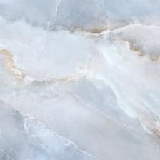 Коллекция Blumarin с суперполированной поверхностью для укладки на пол гостиной, прихожей, ванной комнаты, кухни, а также для облицовки стен ванной комнаты, санузла. Формат плитки 600х1200 и 600x600 мм. Ректифицированный край позволяет сделать укладку с минимальным швом. Современная графика оникса выполнена в лилово-голубой гамме. Такой сочный и необычный оттенок керамогранита с объемным природным рисунком напоминает небо с бело-золотистыми облаками на закате. Эта коллекция идеально подойдет для ванных комнат и релакс-пространств, где необходимо настроение неги и умиротворения. Керамогранит Blumarin в сочетании с Ice Onyx или с Domines Super White создаст романтичное настроение в интерьере.