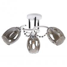 Люстра ЭкономСвет классическая 10051/3CR+WT GR представляет собой надежное и функциональное решение для освещения помещений. Этот накладной светильник оснащен тремя лампами, каждая из которых может быть мощностью до 60 Вт, что обеспечивает общее освещение мощностью 180 Вт. Поддерживаются лампы накаливания и светодиодные, что позволяет выбрать наиболее подходящий вариант. Крепление на планке обеспечивает простоту установки, а цоколь E14 делает замену ламп удобной. Люстра выполнена в классическом стиле с использованием металлической арматуры белого и хромированного цветов, что придает ей элегантный вид. Плафоны из тонированного стекла с глянцевой поверхностью направлены в стороны и вниз, обеспечивая равномерное распределение света на площади до 7 м?.