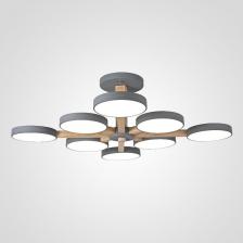 Потолочный светильник IMPERIUMLOFT TURNA L8 Grey 228857-26 представляет собой современное решение для освещения интерьеров в стиле сканди. Он оснащен встроенными светодиодами, что обеспечивает экономичное потребление энергии при мощности светильника в 120 Вт. Светильник включает восемь ламп, что позволяет равномерно распределить свет по помещению. Диаметр и длина светильника составляют 85 см, а высота — 25 см, что делает его подходящим для различных пространств. Изготовленный из металла и дерева, светильник имеет матовую поверхность, что придает ему стильный и современный вид. Белые акриловые плафоны с молочной поверхностью направлены вниз, создавая мягкое и комфортное освещение. Возможность регулировки цветовой температуры в диапазоне от 3000 до 6000 К позволяет адаптировать освещение под различные нужды. Светильник крепится на планку и питается от сети 220 В, что упрощает его установку и эксплуатацию.