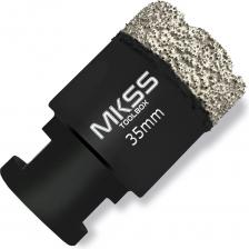 Универсальная алмазная коронка «HARD» MKSS является оптимальным выбором для сверления различных материалов, включая керамогранит, керамику, гранит, мрамор, бетон и кирпич. Основной характеристикой данного инструмента является наличие специального воска, который в процессе работы нагревается и забирает часть образовавшегося тепла на себя, обеспечивая охлаждение алмазного элемента. Технология производства данной оснастки, основанная на высокотемпературной вакуумной пайке, позволяет сверлить прочные материалы без необходимости применения водяного охлаждения. Коронка с резьбой под хвостовик М14 обеспечивает высокую скорость сверления на угловых шлифовальных машинах с максимальной частотой вращения 12000 оборотов в минуту. Сверление необходимо проводить в безударном режиме. Результатом использования данного инструмента будет ровное и точное отверстие без крошек и трещин на рабочей поверхности. Внимание, изображение товара может отличаться от реального! Верные параметры указаны в технических характеристиках товара.