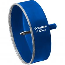 Покрытие алмазных коронок выполнено ?гальваническим? способом в два слоя, что обеспечивает эффективное сверление и продолжительный рабочий ресурс инструмента. При сверлении отверстий с использованием алмазных коронок все работы производятся только с охлаждением, путем подачи в рабочую зону воды или другой СОЖ. Применение Предназначены для сверления отверстий в керамической и кафельной плитке, стекле, при обязательном водяном охлаждении. Используются с дрелями и шуруповертами в режиме безударного сверления.