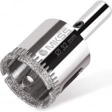 Алмазная коронка MKSS с центрирующим сверлом предназначена для аккуратного выполнения отверстий в материалах, таких как керамика, кафель и стекло. Ее рабочая часть покрыта алмазами, что гарантирует высокую эффективность и отличное качество реза. Коронка с цилиндрическим хвостовиком совместима с быстрозажимными и ключевыми патронами электроинструментов. Для охлаждения и удаления шлама во время работы необходимо использовать воду, это также поможет избежать перегрева инструмента.Важно отказаться от ударного режима и внимательно контролировать скорость вращения, чтобы обеспечить оптимальные условия для сверления.