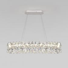 Выразительная люстра Strotskis преобразит потолочное пространство и создаст в вашем помещении полноценное освещение на площади 21 м кв. Декоративные хрустальные пластины, со встроенными LED, переливаются на свету искристыми завораживающими бликами. В производстве подвесной люстры использовали особое стекло с эффектной огранкой и высококачественный металл с надежным защитным покрытием.