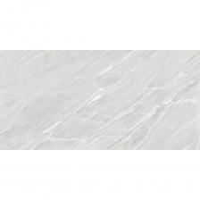 Полированная коллекция Tamarino в формате 600х1200 мм произведена с использованием текстуры итальянского кварцита Tamarino, добытого в горах Тосканы. Его уникальный глубокий дымчато-серый оттенок с деликатными прожилками в виде разломов, которые заполнены кристаллической белой породой, завораживают своей уникальностью. Tamarino совместил в себе эстетику текстуры и долговечность материала. Ведь не зря керамогранит ценится на протяжении многих лет за свою необычайную долговечность, прочность, эстетику и функциональность.