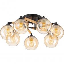 Потолочная люстра Citilux Tika станет идеальным решением для интерьера. Модный стиль лофт, металлический чёрный матовый корпус, натуральное дерево и плафоны из прозрачного стекла светло-янтарного оттенка превратят вашу комнату в уютный уголок. Поворотные шарниры позволяют направить плафоны в любую сторону, а тип крепления рожков собрать компактную или раскидистую модель. В изделии используются 7 ламп с цоколем Е27, максимальной мощностью для ламп накаливания 75Вт (в комплект не входят, приобретаются отдельно). Люстра рассчитана на работу как с одноклавишным, так и с двухклавишным выключателем, поэтому вы сможете настроить освещение под свои предпочтения и задачи. Модель подходит для всех видов потолков, в том числе натяжных, тип крепления – планка. Потолочная семирожковая люстра Ситилюкс станет прекрасным дополнением к вашему современному интерьеру городской квартиры или загородного дома. Легко обеспечит качественное освещение просторного зала, гостиной, спальни, кухни и кабинета.