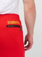 Спортивные штаны красного цвета с манжетами, без лампасов. Плотный футер – фото 4