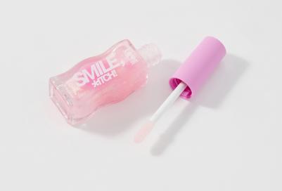 Блеск для губ "Smile, *itch!", тон 05 прозрачный с золотистыми сияющими частицами – фото 4