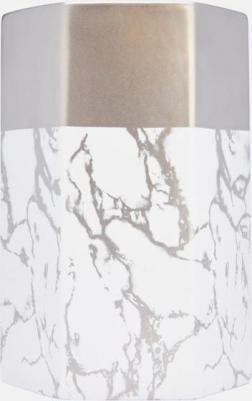 Оригинальная форма, стилизация металла и мрамора, массивные грани – в этой вазе есть все, чтобы стать главным акцентом интерьера. Столь необычные